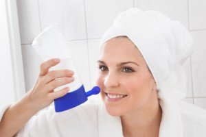 Young Woman Cleaning Nose